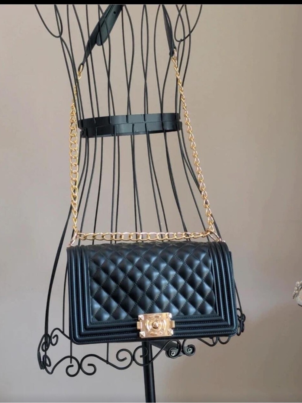 Black Quilted Crossbody Bag with Gold Chain Strap and Clasp Closure